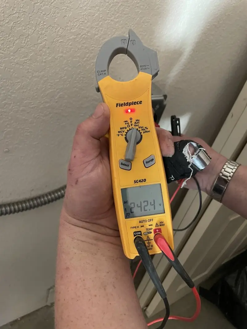 Voltage testing with clamp meter during Generator Installation in Montville